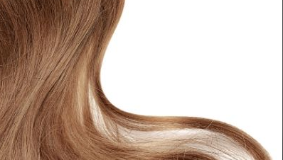 Healthy locks of brown hair that have experienced good hair care