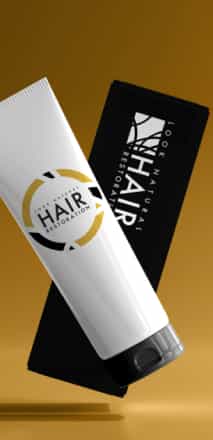 Two hair growth products, a white tube and a black rectangular case, appear over a golden-orange background.